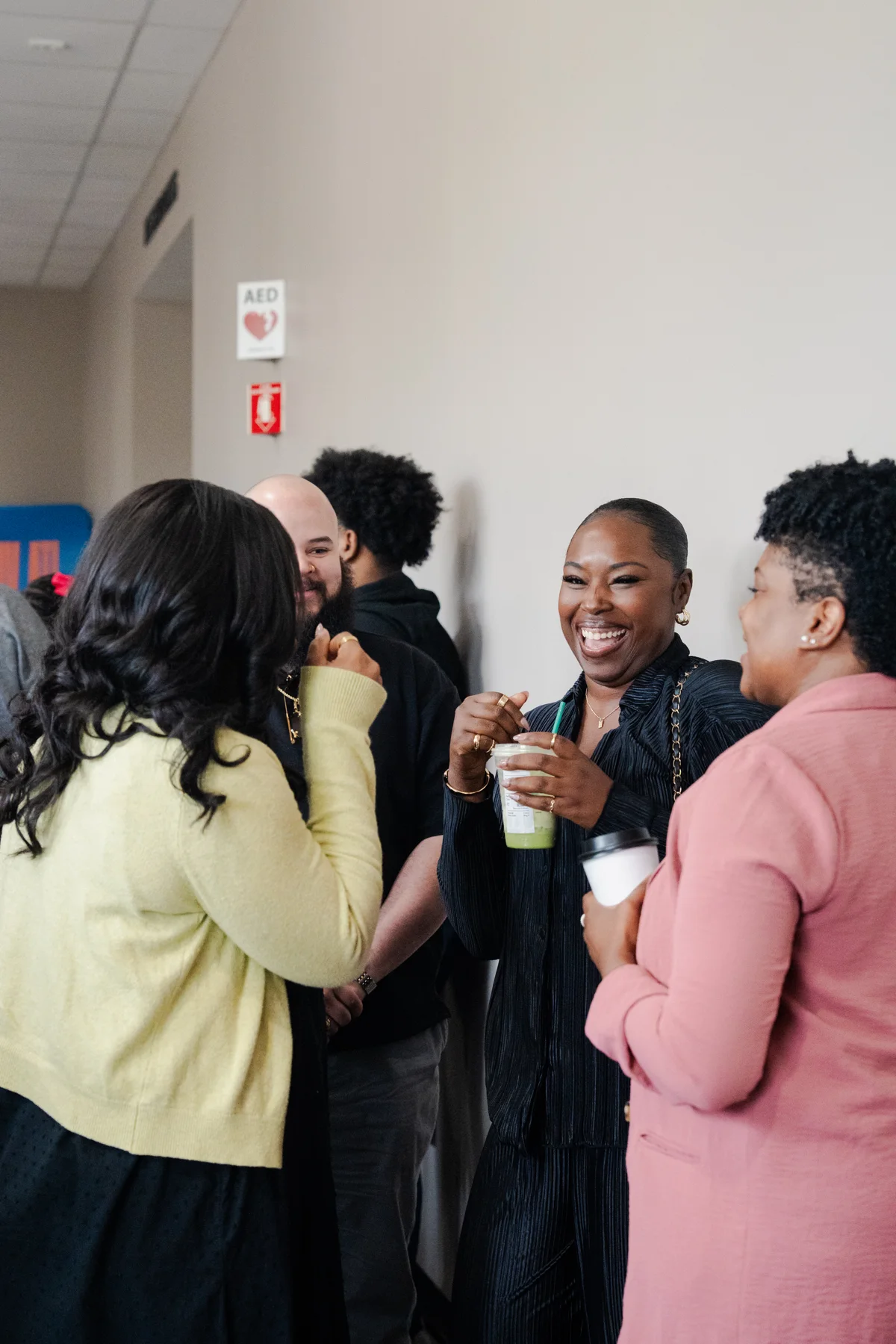 Friends connecting in the LIIV foyer